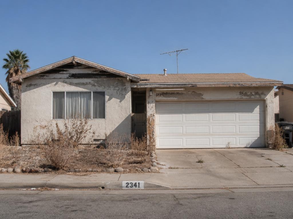 Neglected Orange County home with heavily peeling and faded exterior paint