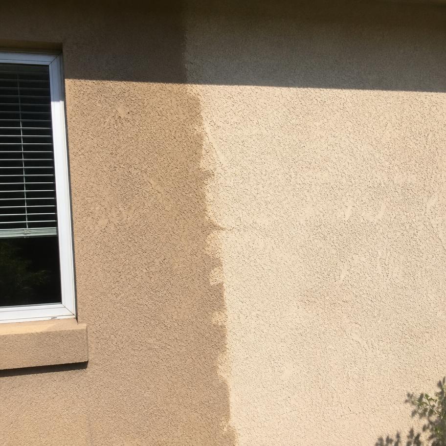 Sun-bleached stucco wall next to a shaded original color